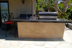<div class='closebutton' onclick='return hs.close(this)' title='Close'></div><div class='firstH'><img src='/images/logo-white-small.png'></div><h1>Outdoor Kitchens and BBQ Grill</h1><p>Outdoor Kitchens and BBQ Grill #027 by Horusicky Construction</p><div class='getSocial'><h1>Share</h1><p class='photoBy'>Photo by Horusicky Construction</p><iframe src='https://www.facebook.com/plugins/like.php?href=http%3A%2F%2Fhorusicky.com%2Fimages%2Fgalleries%2Fkitchens-and-bbq-grills2%2Fwm%2Fkitchen-and-bbq-grill-by-horusicky-construction-027.jpg&send=false&layout=button_count&width=100&show_faces=false&action=like&colorscheme=light&font&height=21' scrolling='no' frameborder='0' style='border:none; overflow:hidden; width:100px; height:21px;' allowTransparency='true'></iframe><br><a href='http://pinterest.com/pin/create/button/?url=http%3A%2F%2Fwww.horusicky.com&media=http%3A%2F%2Fwww.horusicky.com%2Fimages%2Fgalleries%2Fkitchens-and-bbq-grills2%2Fwm%2Fkitchen-and-bbq-grill-by-horusicky-construction-027.jpg&description=Pools' data-pin-do='buttonPin' data-pin-config=\'above\'><img src='https://assets.pinterest.com/images/pidgets/pin_it_button.png' /></a><br></div>